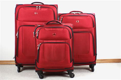 Designer Luggage & Wheeled Suitcases .